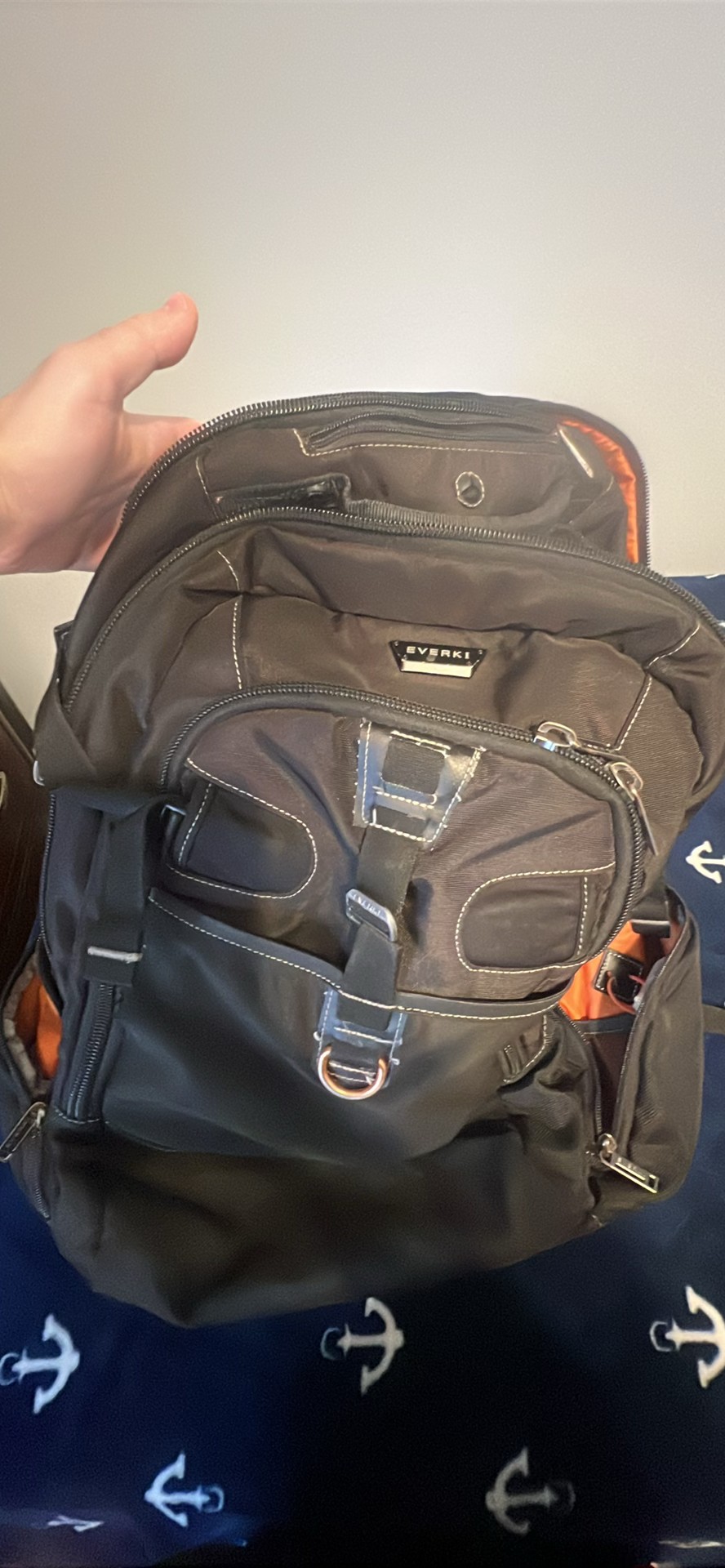 Everki Black Laptop Backpack with Orange Interior and Multiple Pockets